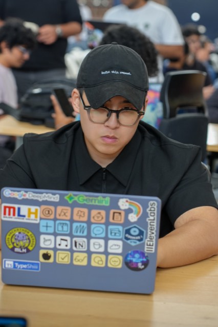 Phu Quach at a hackathon — building, competing, and networking