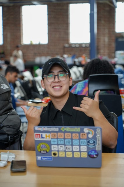 Phu Quach at a hackathon — building, competing, and networking