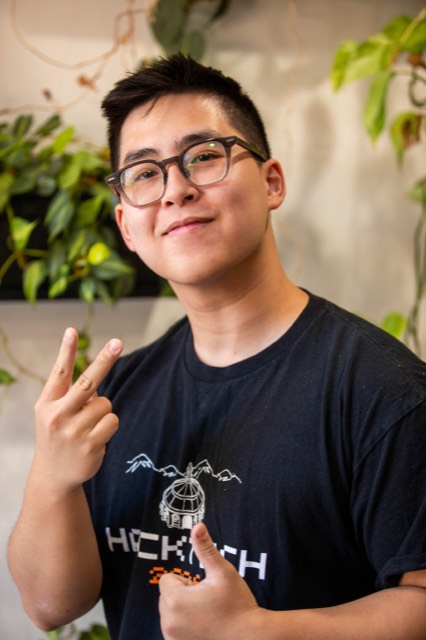 Phu Quach at a hackathon — building, competing, and networking
