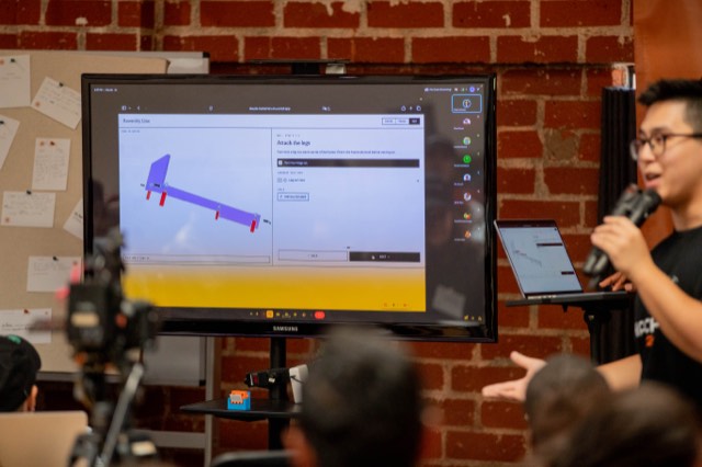 Phu Quach at a hackathon — building, competing, and networking