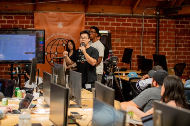 Phu Quach at a hackathon — building, competing, and networking