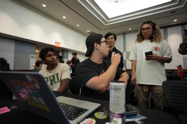 Phu Quach at a hackathon — building, competing, and networking