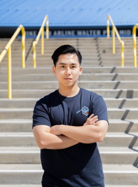 Phu Quach at a hackathon — building, competing, and networking