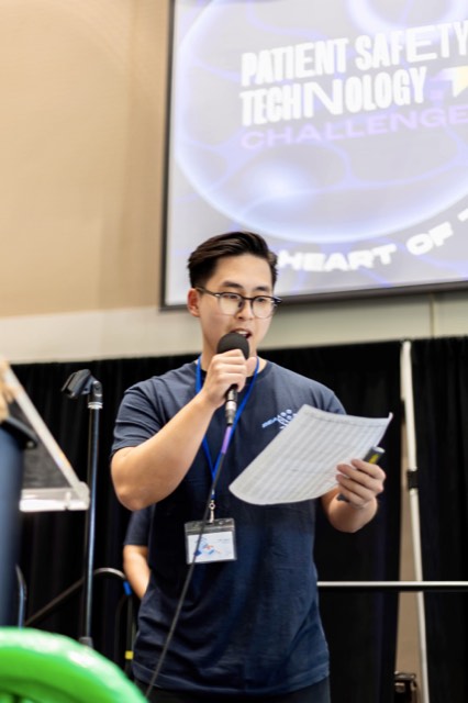Phu Quach at a hackathon — building, competing, and networking